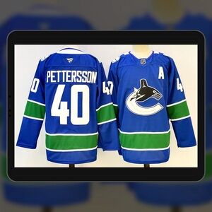 Men's NHL Vancouver Canucks #40 Elias Pettersson Fanatics Home Breakaway Jersey